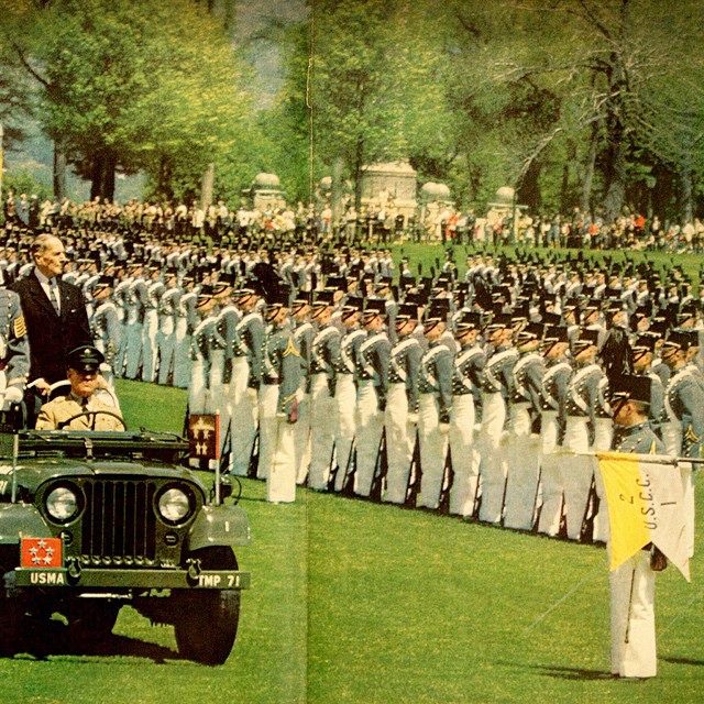 Jim Ellis' arm is to General MacArthur's right.