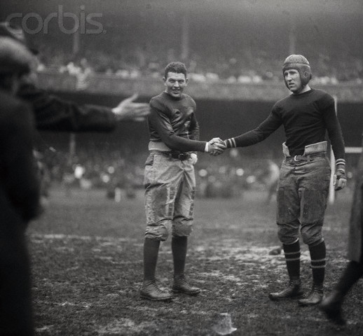 Football Players Behaving Amicably on Field